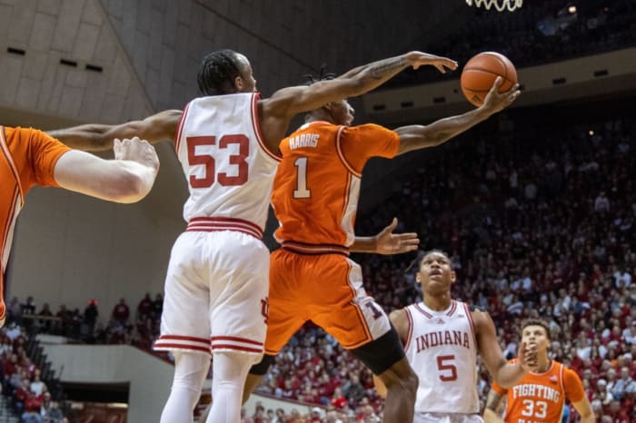 Illinois Fighting Illini guard Sencire Harris (1) shoots the ball while Indiana Hoosiers guard Tamar Bates (53) defends in the second half at Simon Skjodt Assembly Hall.